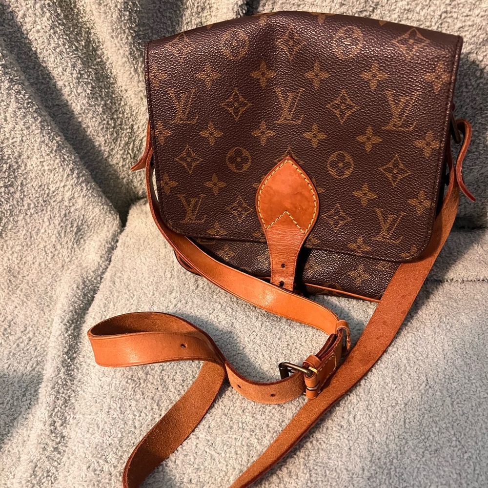 Authentic Louis Vuitton Cartoucherie shoulder bag
